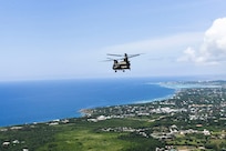 A U.S. Army CH-47 Chinook helicopter assigned to the 1st Battalion, 228th Aviation Regiment, Joint Task Force-Bravo flies off the coast Montego Bay, Jamaica, August 16. Two U.S. Army CH-47 Chinook and two UH-60 Black Hawk helicopters with the 1-228 deployed from Soto Cano Air Base, Honduras to support U.S. Southern Command operations to assist Haiti after a 7.2 earthquake devastated the country. (U.S. Air Force photo by Capt. Annabel Monroe)