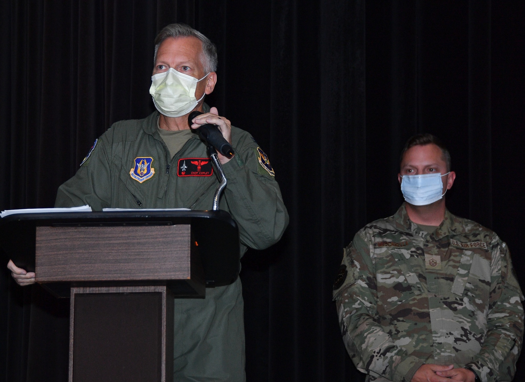 (left) 301st Fighter Wing Medical Squadron Commander Col. Lawson Copley addresses his Airmen during an MDS enlisted promotion ceremony at NAS JRB Fort Worth on August 8, 2021. (left) 301st Fighter Wing Medical Squadron Commander Col. Lawson Copley addresses his Airmen as MDS First Sgt. Julian Muscarella, the ceremony's narrator, looks on during an MDS enlisted promotion ceremony at NAS JRB Fort Worth on August 8, 2021. More than 30 Airmen in attendance were recognized as they promoted up to their next military rank. (U.S. Air Force photo by Master Sgt. Jeremy Roman)