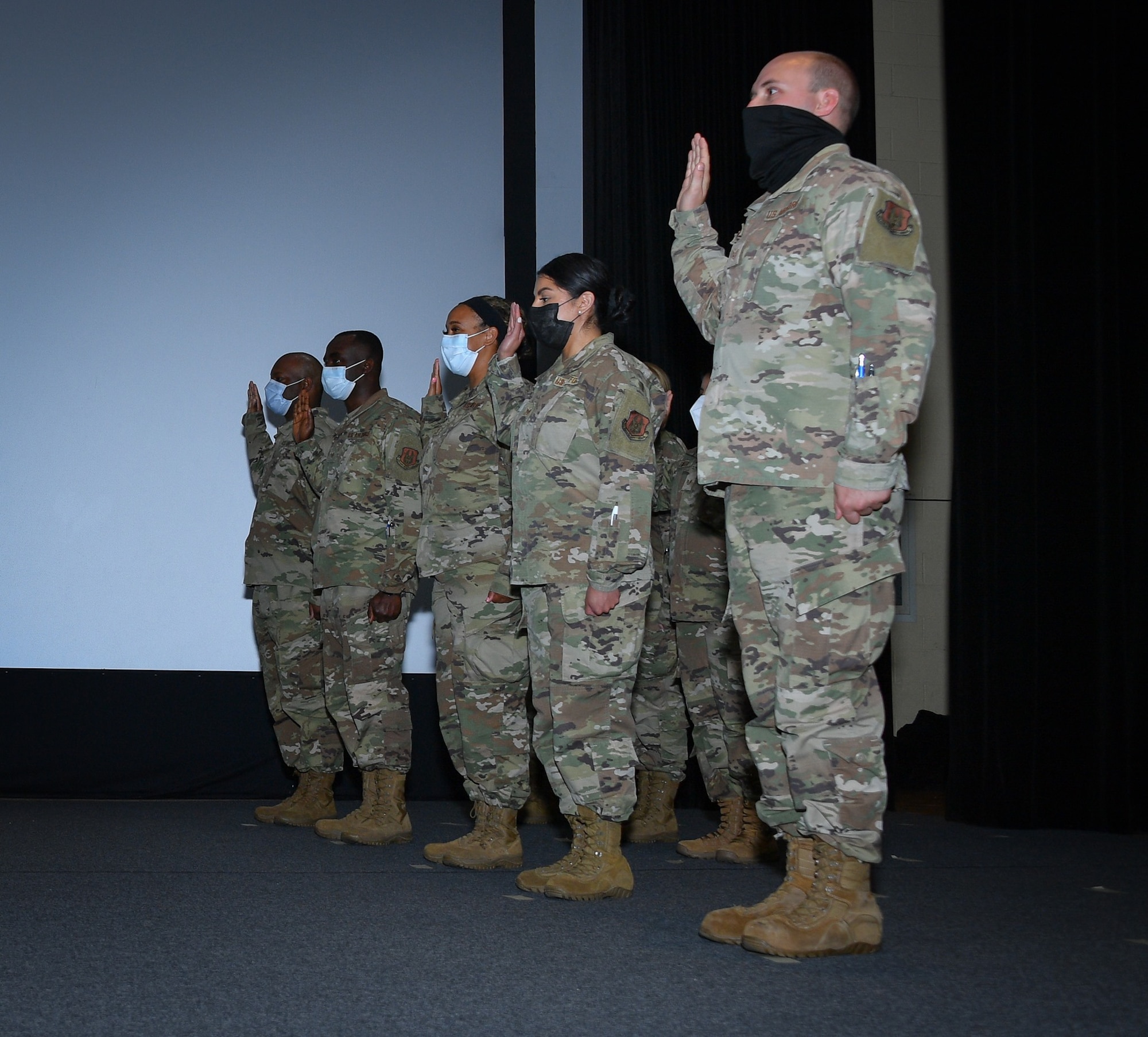 The 301st Fighter Wing Medical Squadron's junior enlisted Airmen  transition to the Non-Commissioned Officer ranks during an MDS enlisted promotion ceremony at NAS JRB Fort Worth on August 8, 2021. Airmen at this level take on the expectation of leading and developing junior Airmen to advance in their respective careers. (U.S. Air Force photo by Master Sgt. Jeremy Roman)
