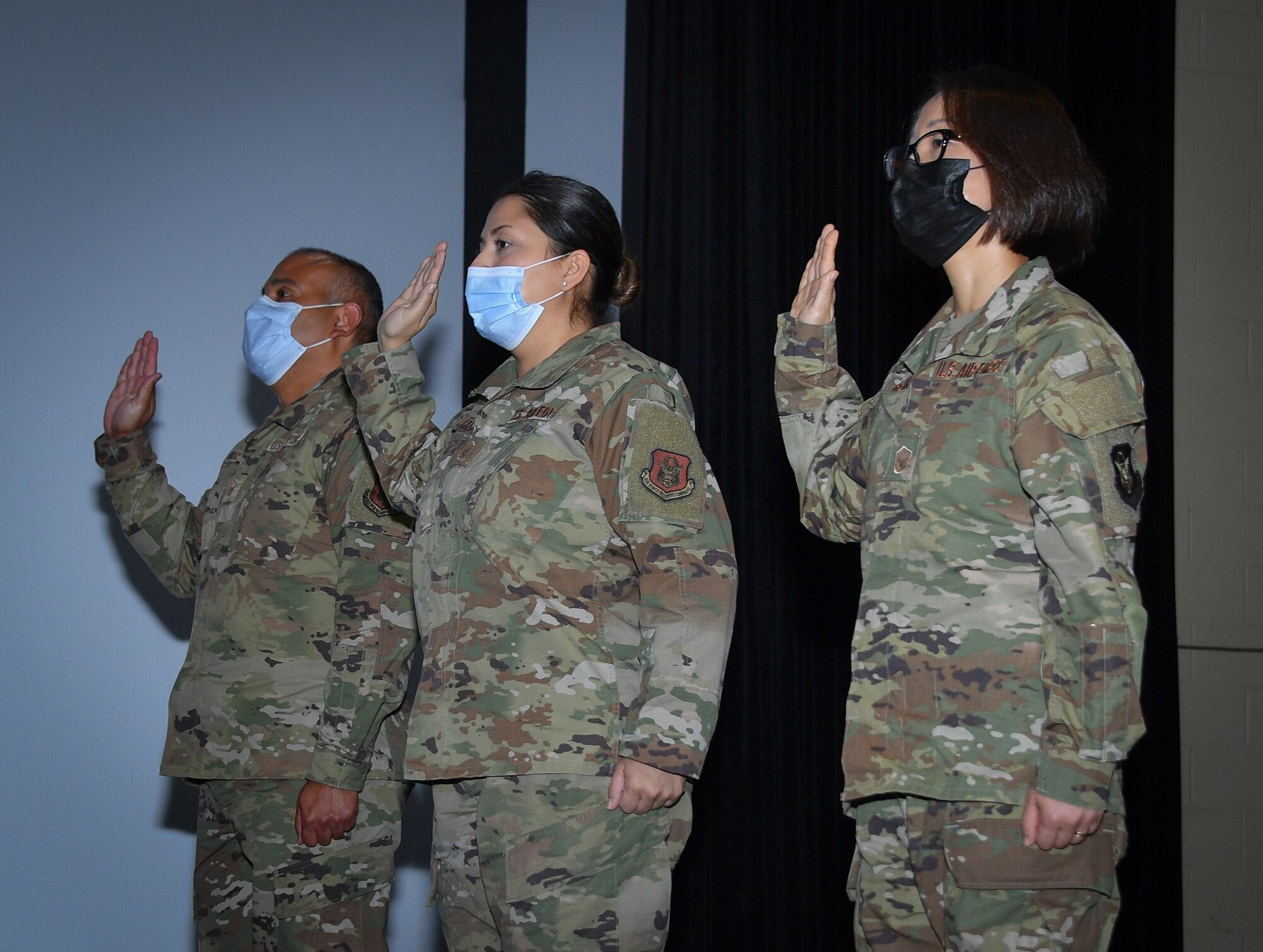 The 301st Fighter Wing Medical Squadron's Non-Commissioned Officers accept the charge and role as they transition to Senior Non-Commissioned Officers during an MDS enlisted promotion ceremony at NAS JRB Fort Worth on August 8, 2021. The ceremony took place in front of the entire MDS and 301 FW command leadership as witnesses. (U.S. Air Force photo by Master Sgt. Jeremy Roman)