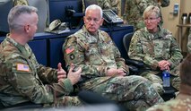 Army Col. Mike Hatfield, left, briefs Lt. Gen. Jon Jensen, the director of the Army National Guard, center, and Brig. Gen. Laura Clellan, the Adjutant General of Colorado, during a demonstration scenario in the Missile Defense Element at Schriever Space Force Base, Colorado, July 26, 2021. Jensen visited the 100th Missile Defense Brigade of the Colorado Army National Guard in Colorado Springs to learn more about the unit and its mission to defend the United States and designated areas from long-range ballistic missile attacks. (U.S. Army National Guard photo by Staff Sgt. Zach Sheely)