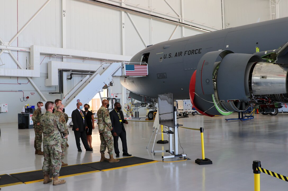 Gene Harris, 568th Maintenance Squadron director, updates Air Force Chief of Staff Gen. CQ Brown, Jr. about ongoing aircraft inspection and maintenance efforts at the new KC-46 Pegasus