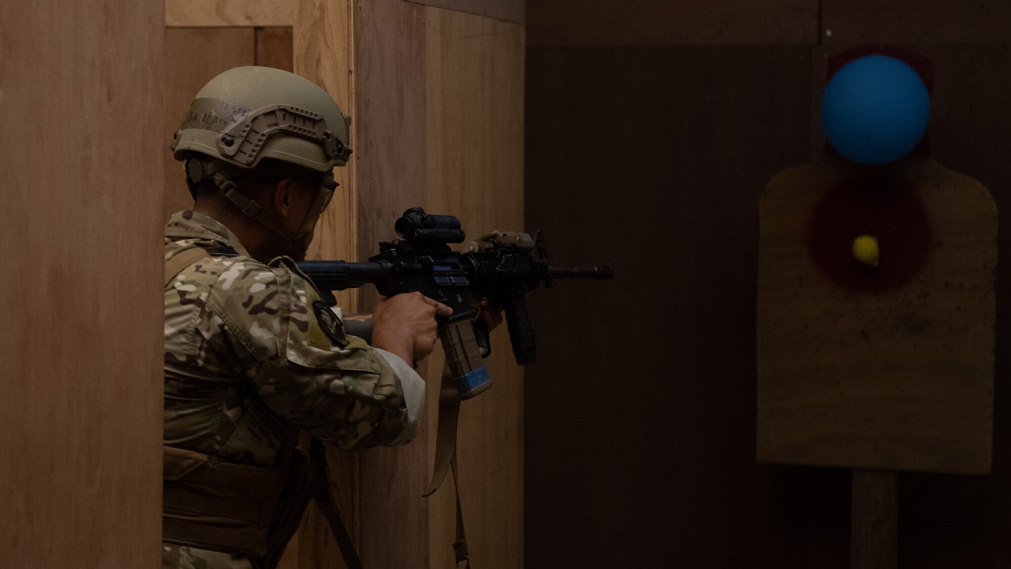 An 18th Security Forces Squadron defender clears a hallway during the Defender Flight of the Quarter Challenge on Kadena Air Base, Japan, Aug. 12, 2021. This scenario was the last event for the teams in the challenge. (U.S. Air Force photo by Airman 1st Class Stephen Pulter)