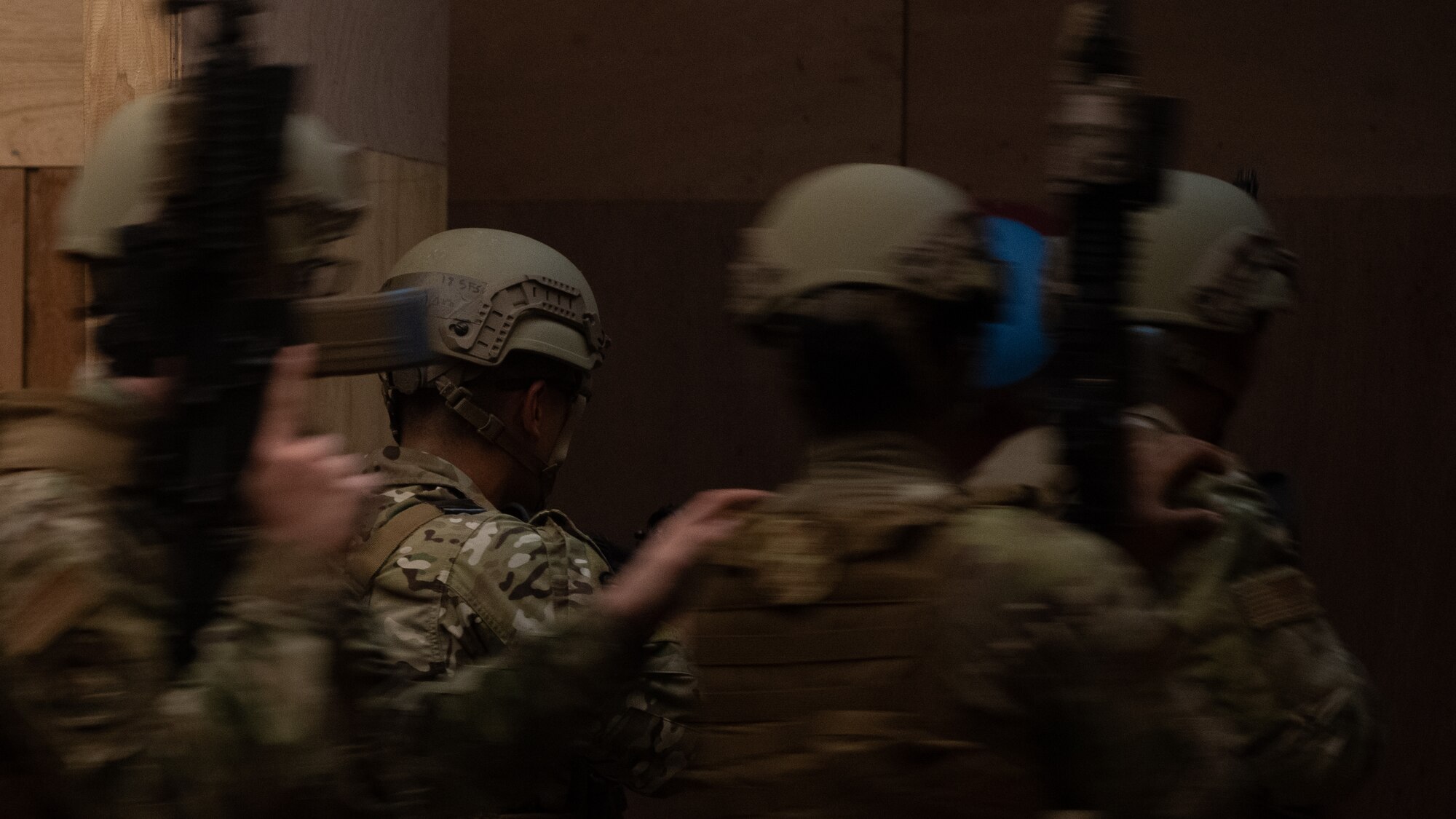 18th Security Forces Squadron defenders conduct a room clearing event during the Defender Flight of the Quarter Challenge on Kadena Air Base, Japan, Aug. 12, 2021. This scenario was allowed for Airmen to test their skills for room clearing procedures. (U.S. Air Force photo by Airman 1st Class Stephen Pulter)