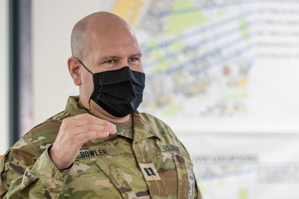 Capt. Timothy Bowler, 84th Training Command Diamond Saber exercise planner and finance officer, briefs the Diamond Saber exercise evaluation team at Fort McCoy, Wisconsin, Aug. 14, 2021. Diamond Saber is a U.S. Army Reserve-led exercise that incorporates participation from all components and joint services, and it prepares finance and comptroller Soldiers on the warfighting functions of funding the force, payment support, disbursing operations, accounting, fiscal stewardship, auditability and data analytics. (U.S. Army photo by Mark R. W. Orders-Woempner)