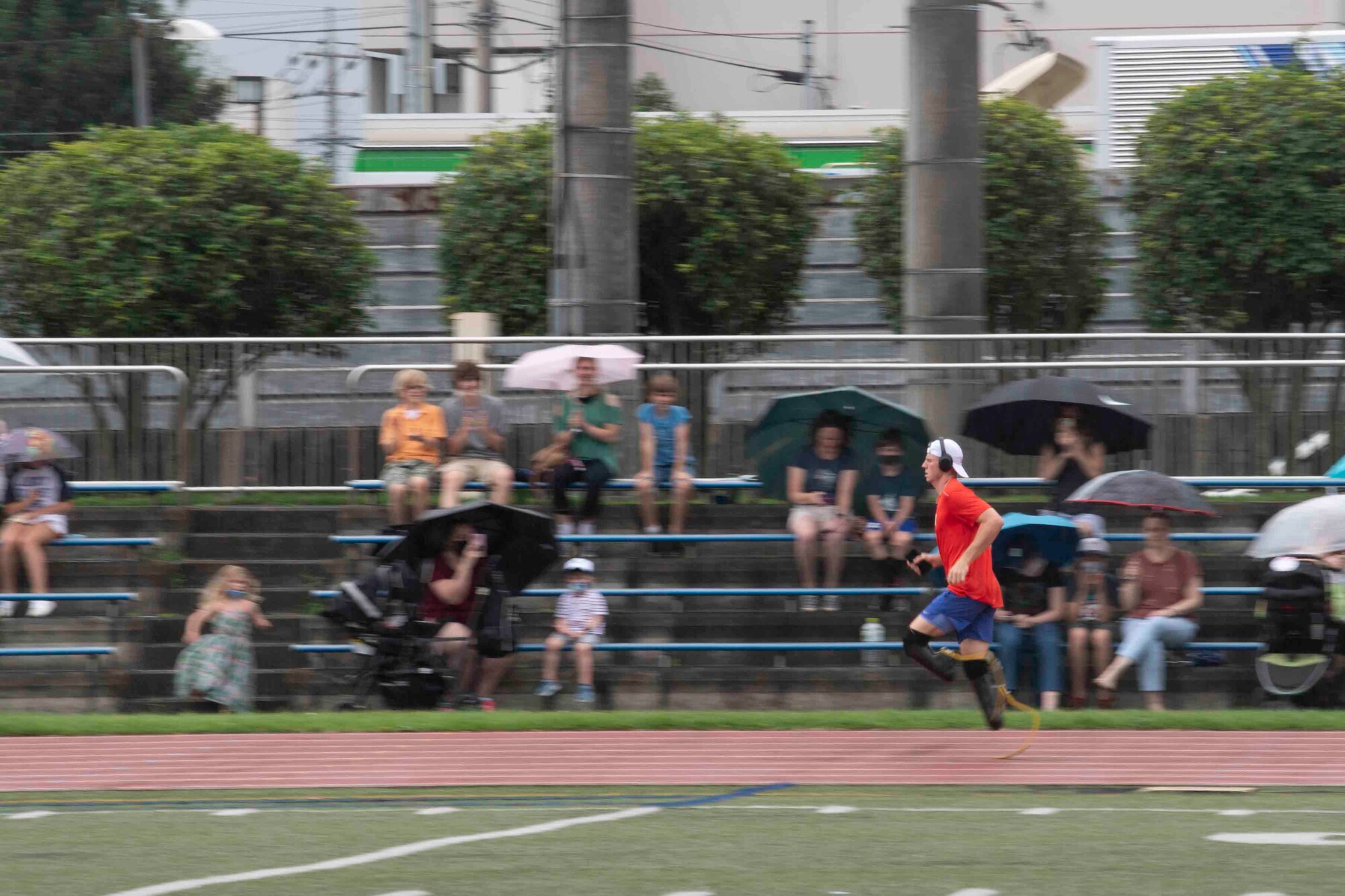 Hunter Woodhall, U.S. Para track and field team member, runs during a practice session at Yokota Air Base, Japan, Aug. 18, 2021.