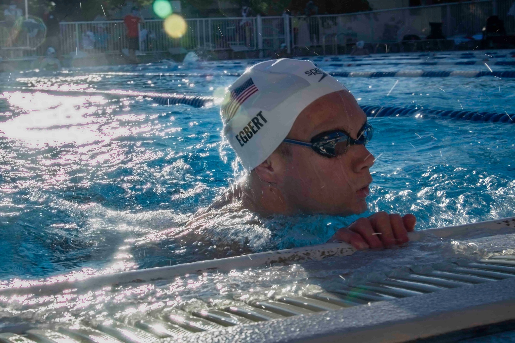 Parker Egbert, U.S. Paralympic swimmer, finishes a practice lap at Yokota Air Base, Japan, Aug. 18, 2021, before competing in the 2020 Summer Paralympic games in Tokyo.