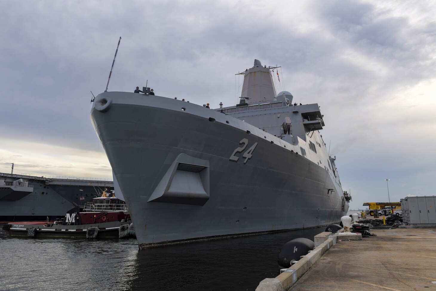 NAVAL STATION NORFOLK (Aug. 17, 2021) The amphibious transport dock ship USS Arlington (LPD 24) departs Naval Station Norfolk.  Arlington will support humanitarian assistance and disaster relief (HADR) efforts in Haiti following a 7.2-magnitude earthquake on Aug. 14, 2021. (U.S. Navy photo by Mass Communication Specialist 1st Class Jacob Milham)