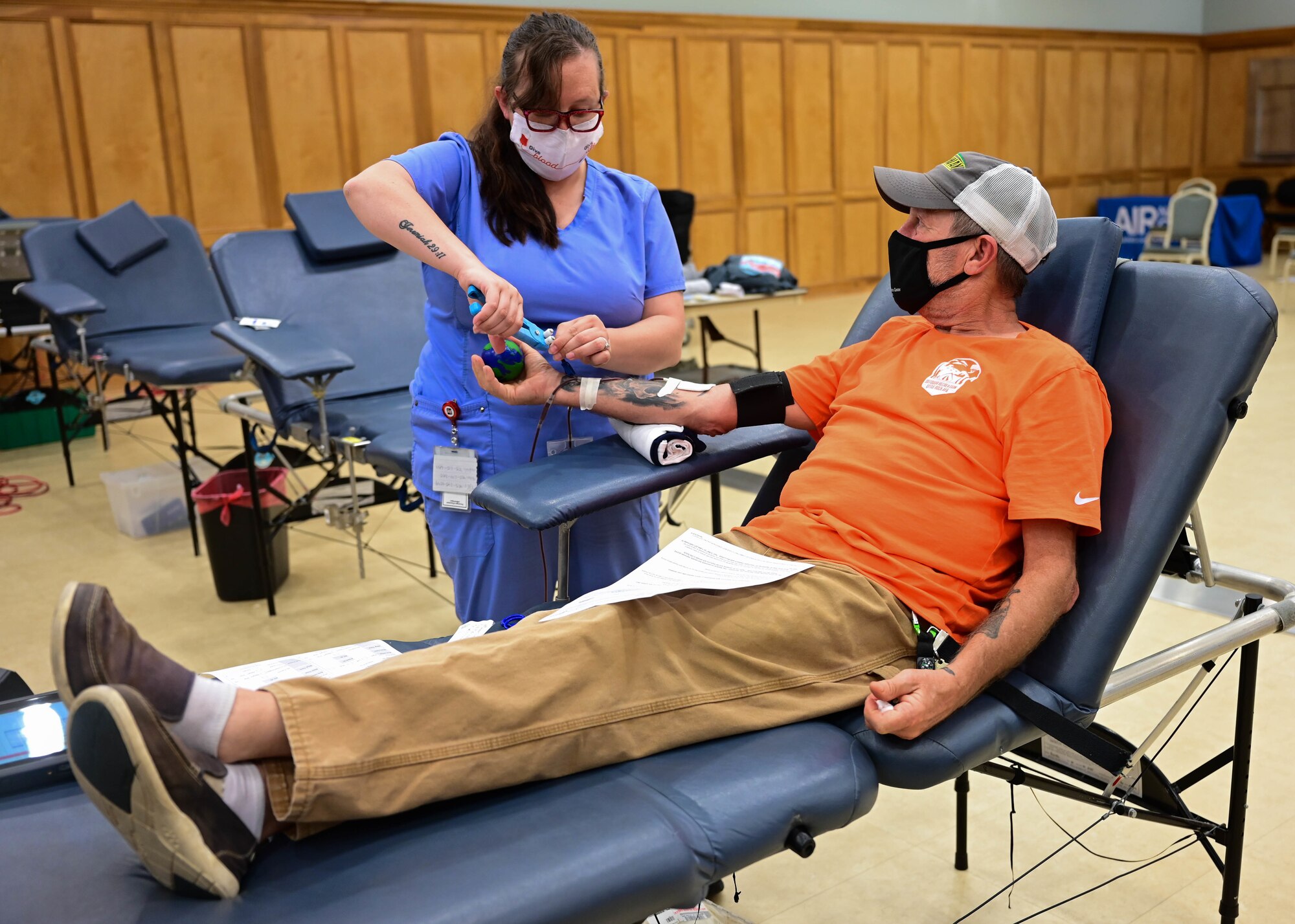 Rick Bennett, 19th Force Support Squadron outdoor recreation assistant, donates blood for a blood drive