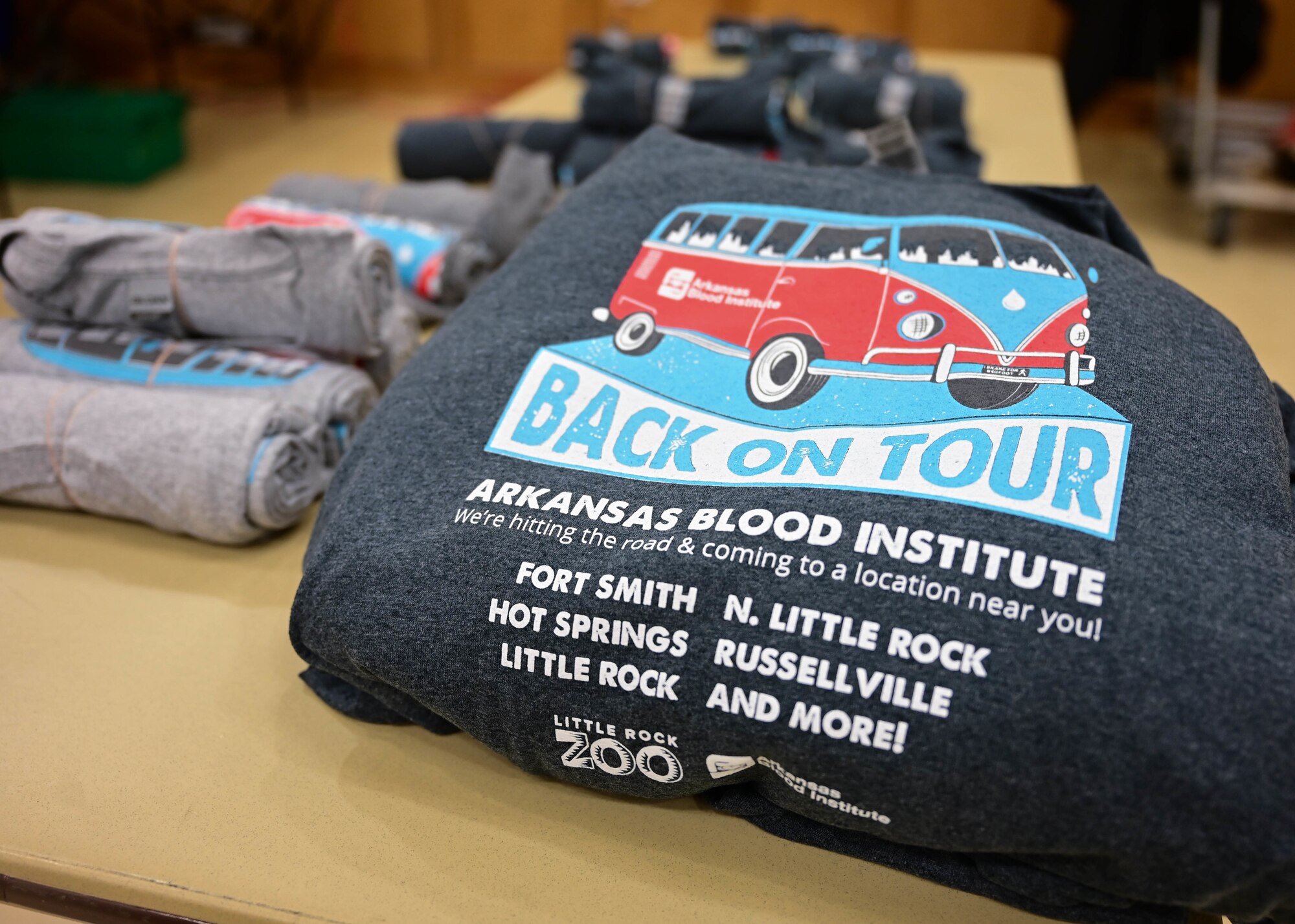 A graphic T-shirt for the Arkansas Blood Institute sits on display at a blood drive