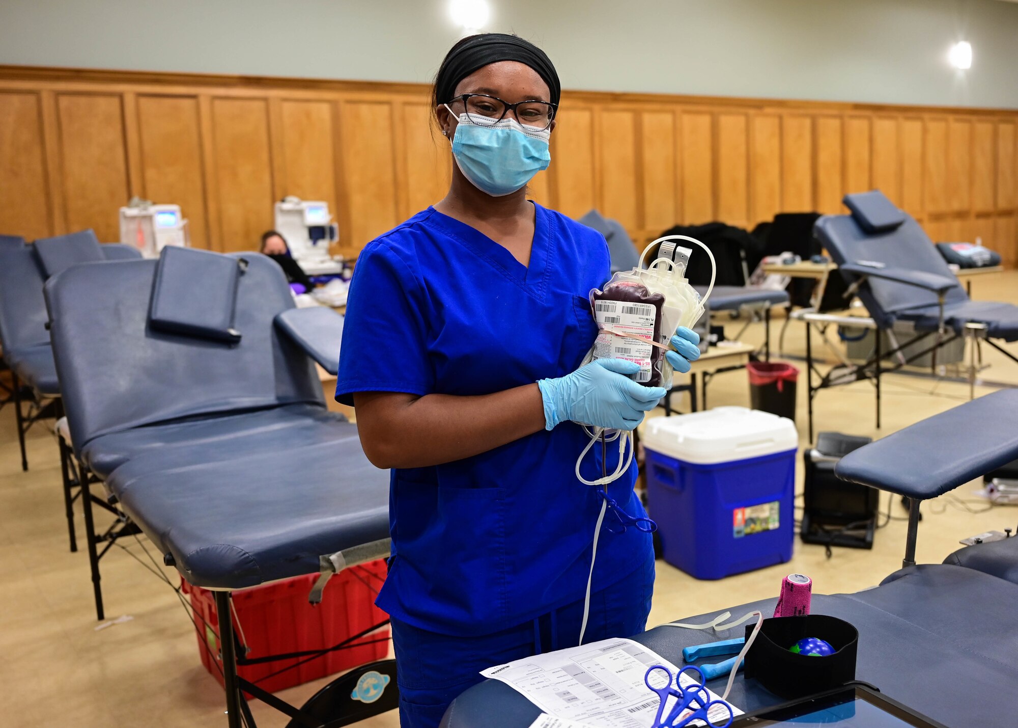 A phlebotomist from the Arkansas Blood Institutes poses for a photo during a blood drive