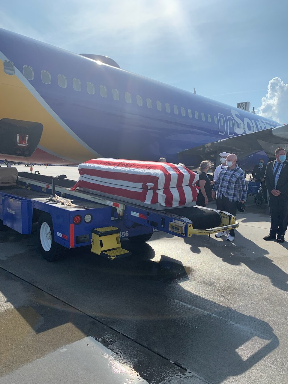210715-N-ZZ999-001 (July 15, 2021) Raleigh NC. - 84-year-old Cecil Jeffers of Cary, NC, greets the remains of Navy Seaman Second Class Russell Orville Ufford of Kansas City, Missour at the Raleigh-Durham International Airport in Raleigh NC on July 15, 2021. Ufford was killed during the attack on Pearl Harbor, December 7, 1941, and he was identified in February this year. His nephew ,Jeffers, is Ufford�s only known next of kin.(US Navy photo by EO2 Katrena Hovatter)