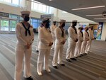 210715-N-ZZ999-001 (July 15, 2021) Raleigh NC. - Navy Operational Support Center Raleigh's funeral honors team prepares to receive the remains of Navy Seaman Second Class Russell Orville Ufford of Kansas City, Missour at the Raleigh-Durham International Airport in Raleigh NC on July 15, 2021. Ufford was killed in action during the attack on Pearl Harbor, December 7, 1941, and he was identified by the POW/MIA accounting agency in February this year. .(US Navy photo by EO2 Katrena Hovatter)