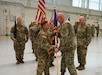 (Left to Right) Lt. Col. Randy Lutz, incoming commander of the Eastern Army National Guard Aviation Training Site, receives the colors of EAATS from Brig. Gen. Edwards S. Little, Jr., assistant Adjutant General for the Pennsylvania National Guard, during the change of command ceremony at Fort Indiantown Gap, on August 12, 2021. The ceremony represented the passing of the command of EAATS from Col. Keith Graham, the outgoing commander, to Lutz (U.S. Army photo by Sgt. 1st Class Matthew Keeler).