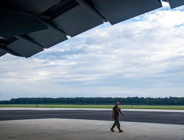Airman 1st Class Kirkland Bocox, 436th Aircraft Maintenance Squadron crew chief, conducts a pre-flight inspection of a C-5M Super Galaxy at Dover Air Force Base, Delaware, Aug. 18, 2021. The 436th AMXS Airmen are responsible for the inspection, repair, launch and recovery of Dover AFB’s fleet of C-5M Super Galaxy aircraft. (U.S. Air Force photo by Senior Airman Stephani Barge)