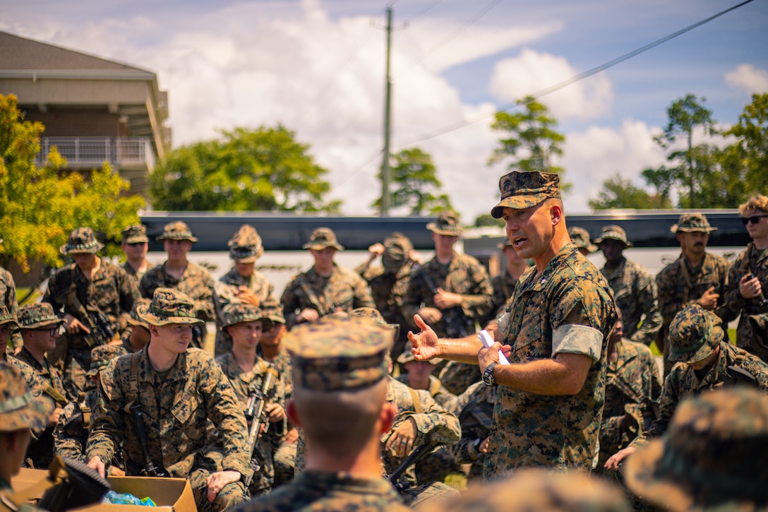 U.S. Marine Corps Lt. Col. Mastin Robeson, the battalion commander with 1st Battalion, 6th Marine Regiment, 2d Marine Division, gives a speech in preparation to depart Camp Lejeune, N.C., Aug. 18, 2021. The Marines from 1/6 are preparing to deploy in support of Joint Task Force-Haiti for a humanitarian assistance disaster relief mission. (U.S. Marine Corps photo by Staff Sgt. Akeel Austin)