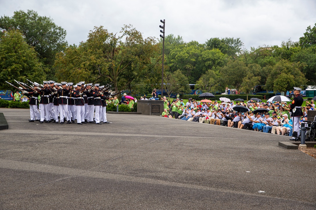 Marines with the Silent Drill Platoon execute their “bursting bomb” sequence during an Honor Flight performance at the Marine Corps War Memorial, Arlington, Va., Aug. 18, 2021. The Honor Flight Network is a national network whose mission is to transport America’s veterans to Washington, D.C. to visit memorials dedicated to honoring those who have served and sacrificed for our country. (U.S. Marine Corps photo by Lance Cpl. Tanner D. Lambert)