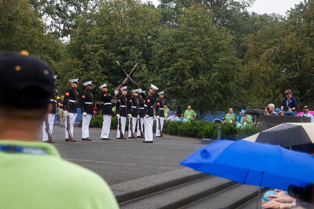 Marines with the Silent Drill Platoon execute their “rifle inspection” sequence during an Honor Flight performance at the Marine Corps War Memorial, Arlington, Va., Aug. 18, 2021. The Honor Flight Network is a national network whose mission is to transport America’s veterans to Washington, D.C. to visit memorials dedicated to honoring those who have served and sacrificed for our country. (U.S. Marine Corps photo by Lance Cpl. Tanner D. Lambert)