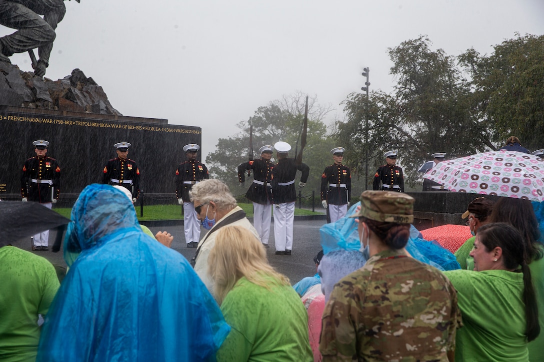 Marines with the Silent Drill Platoon execute their “rifle inspection” sequence during an Honor Flight performance at the Marine Corps War Memorial, Arlington, Va., Aug. 18, 2021. The Honor Flight Network is a national network whose mission is to transport America’s veterans to Washington, D.C. to visit memorials dedicated to honoring those who have served and sacrificed for our country. (U.S. Marine Corps photo by Lance Cpl. Tanner D. Lambert)