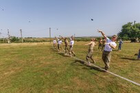 American and Romanian reserve service members participate in an orienteering training event