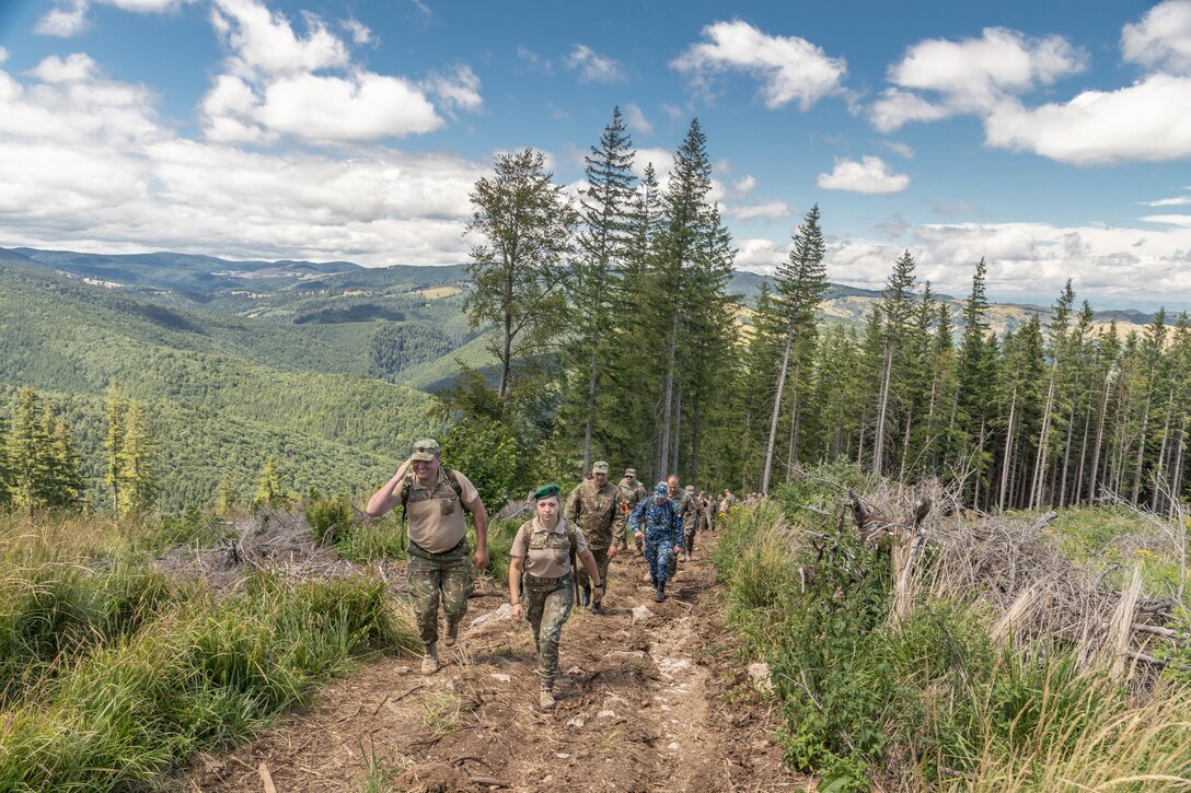 American and Romanian reserve service members participate in an orienteering training event