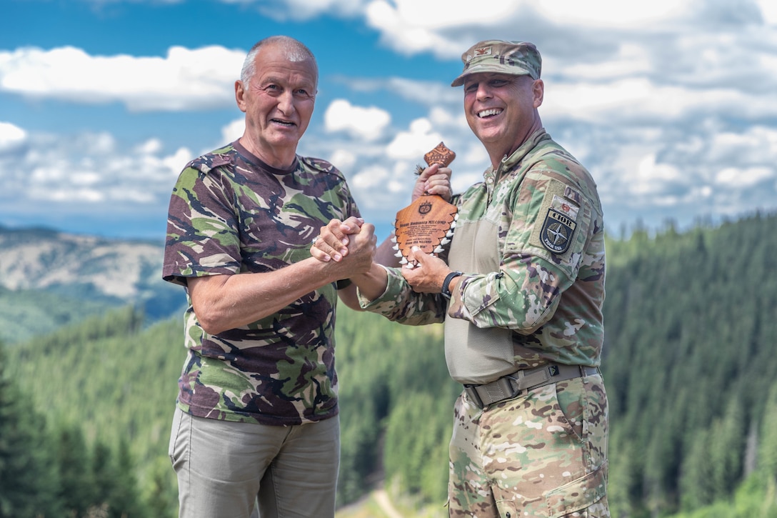 American and Romanian reserve service members participate in an orienteering training event