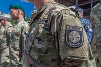 American and Romanian reserve service members participate in an orienteering training event