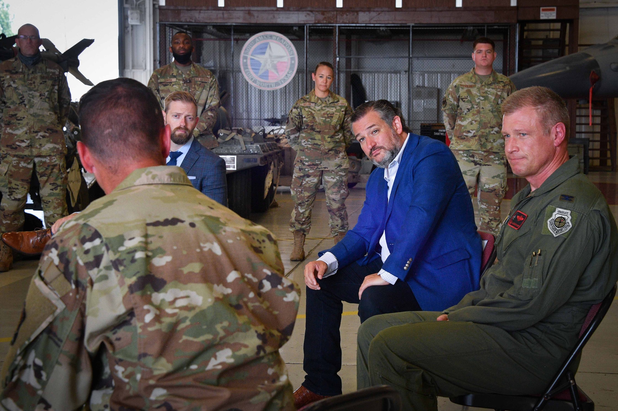 (center) Texas Senator Ted Cruz participates in the 301st Fighter Wing leadership conversation at Naval Air Station Joint Reserve Base Fort Worth, Texas on August 19, 2021. The topics discussed co subjects to include achievements accomplished in the midst of COVID-19, multiple deployments completed, and F-16 operations leading into the wing's F-35A transition. (U.S. Air Force photo by Jeremy Roman)