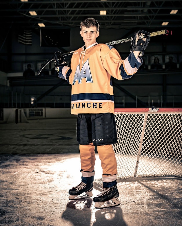 Pfc. Hunter Skaw, a new Soldier in the Alaska Army National Guard, poses for a photo in his Alaska Avalanche Hockey gear. Skaw enlisted while he was a junior at Colony High School in Wasilla, Alaska, and went to basic combat training during the summer before his senior year. He used the Alaska Army National Guard's program to receive high school credits for attending BCT before graduating, and will complete advanced individual training after school. (Courtesy photo by Jeff Heard)