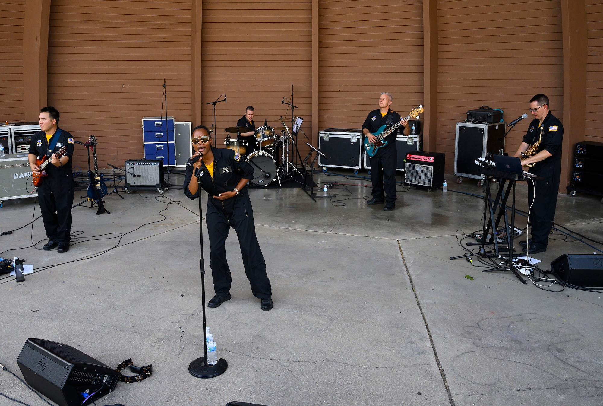 Flight One, the Air Force Band of Flight’s rock ensemble, performs Aug. 13, 2021, at Centerville Community Amphitheater in Stubbs Park, Centerville, Ohio, as part of the city’s “Party in the Park” event. As part of its outreach mission, the band can perform at community-sponsored events, as long as they’re free and open to the public. (U.S. Air Force photo by R.J. Oriez)