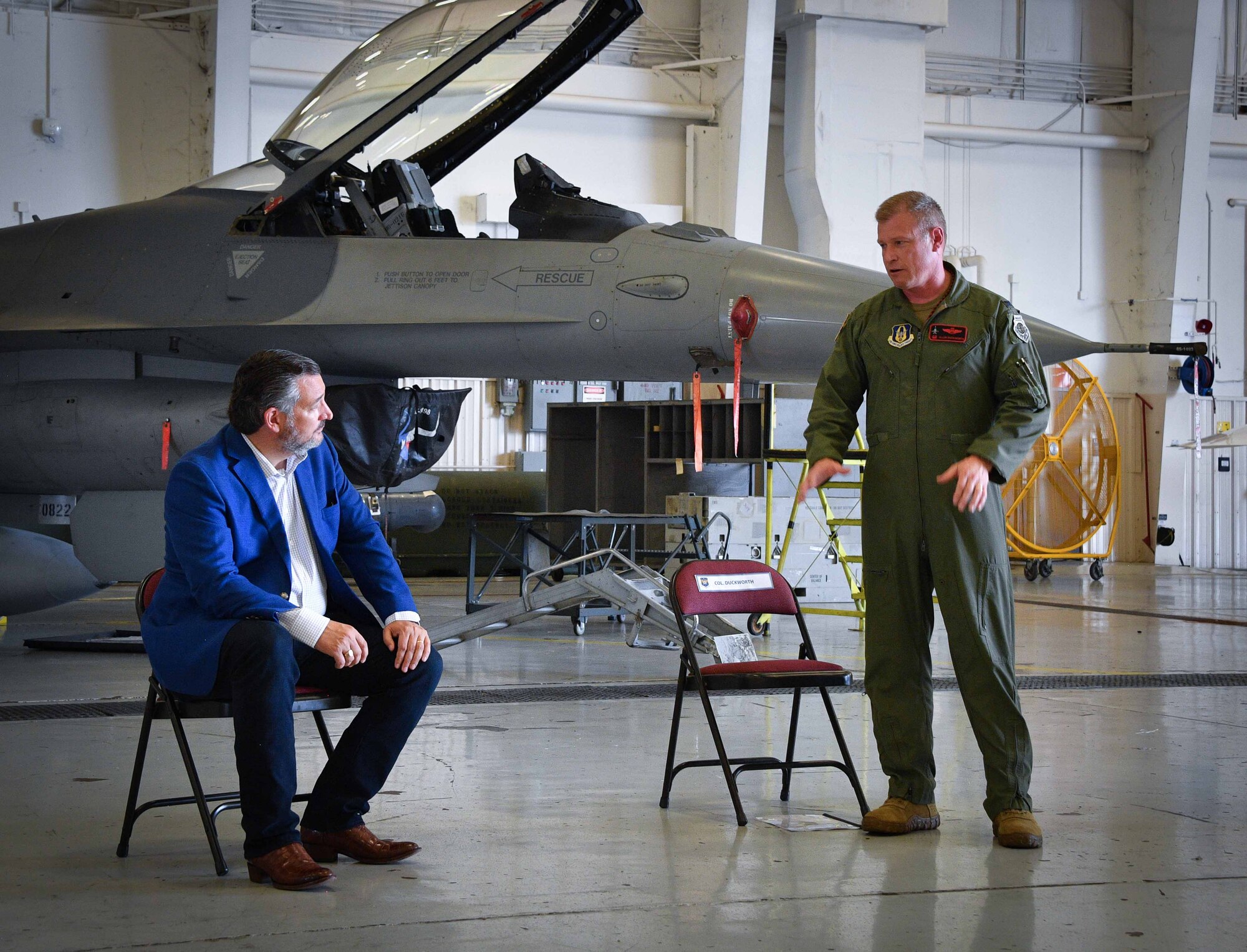 (right) Col. Allen Duckworth 301st Fighter Wing commander speaks with Texas Senator Ted Cruz during the senator's visit to Naval Air Station Joint Reserve Base Fort Worth, Texas on August 19, 2021. The 301 FW mission is to train and deploy and combat-ready Airmen. (U.S. Air Force photo by Jeremy Roman)