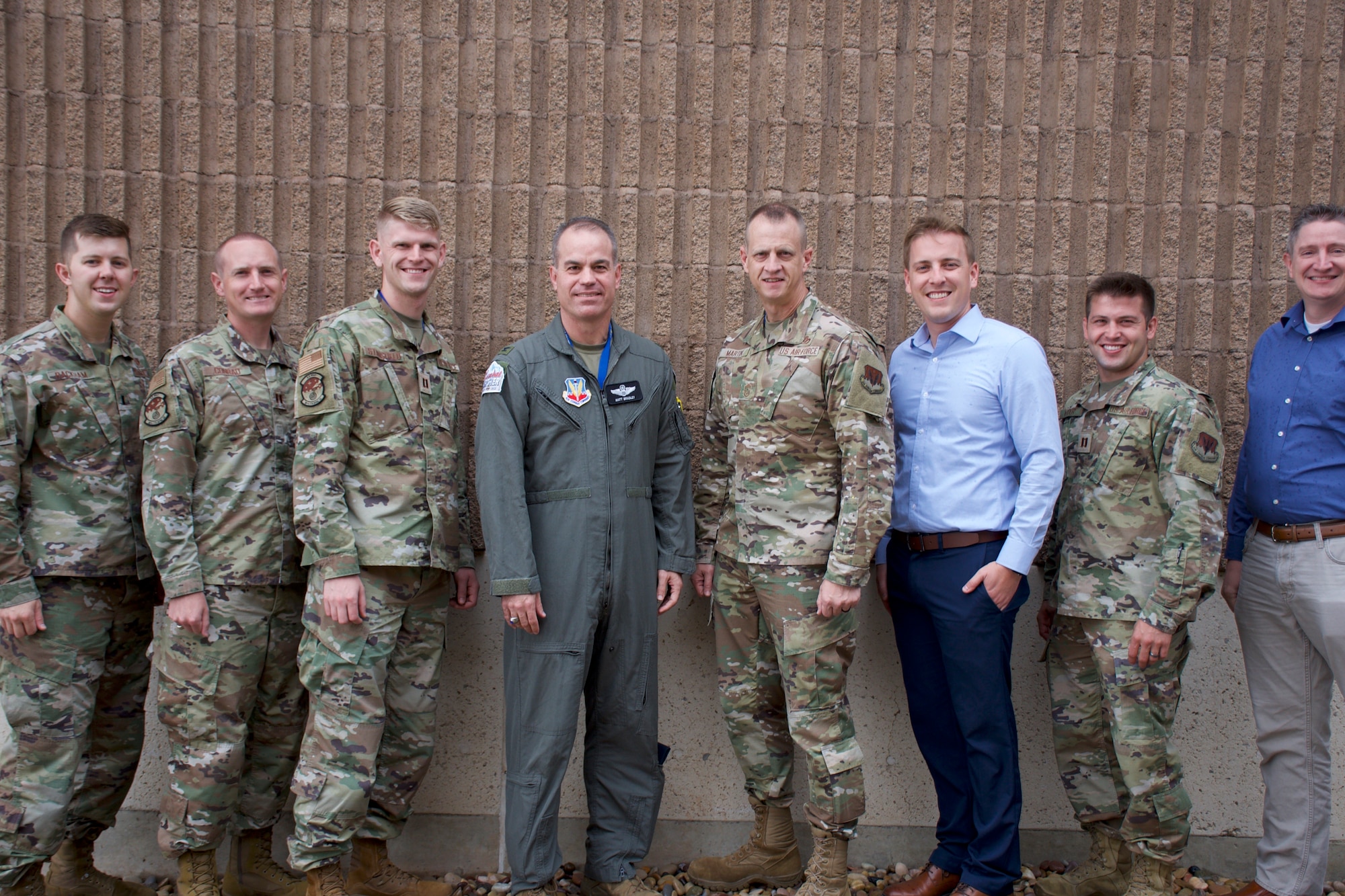 The 86th FWS Analyst Team pictured alongside Col. Matthew Bradley, commander, 53rd Wing, and Chief Master Sgt. Jeffery Martin, command chief, 53rd Wing (U.S. Air Force photo by 1st Lt Lindsey Heflin)