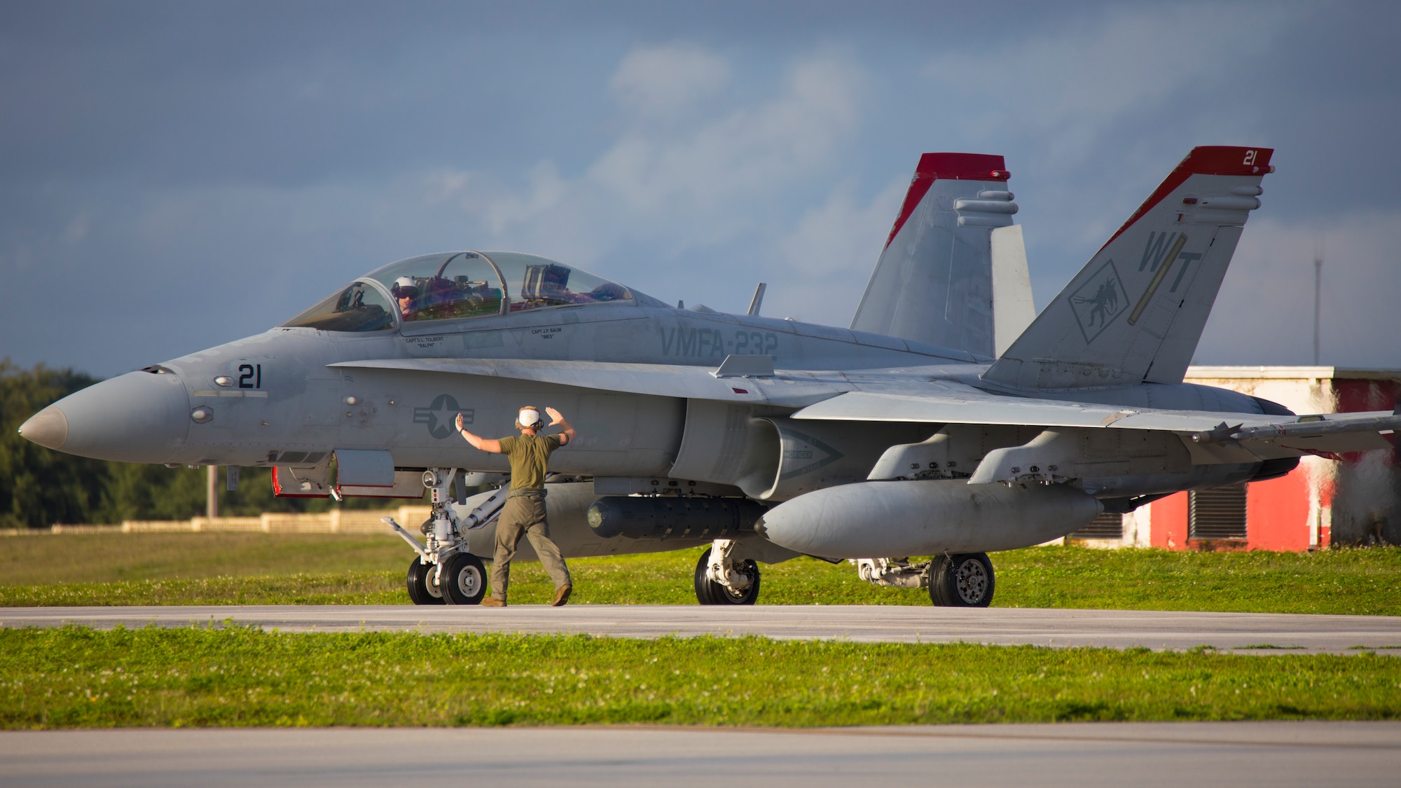 An F/A-18D Hornet aircraft with Marine Fighter Attack Squadron (VMFA) 232 taxis the flight line at Andersen Air Force Base, Guam, Aug. 13, 2021. VMFA-232 deployed to Andersen Air Force Base, Guam as part of the Aviation Training Relocation program, which is designed to increase operational readiness while reducing the impacts of training activities. (U.S. Marine Corps photo by Lance Cpl. Tyler Harmon)