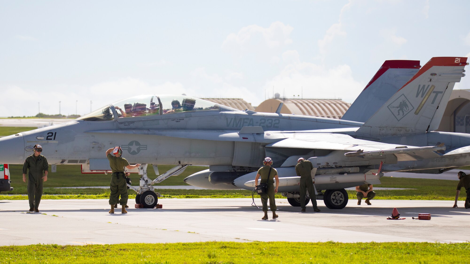 U.S. Marines with Marine Fighter Attack Squadron (VMFA) 232 conduct pre-flight inspections on an AGM-88 High-Speed Anti-Radiation Missile at Andersen Air Force Base, Guam, Aug. 13, 2021. VMFA-232 deployed to Andersen Air Force Base, Guam as part of the Aviation Training Relocation program, which is designed to increase operational readiness while reducing the impacts of training activities. (U.S. Marine Corps photo by Lance Cpl. Tyler Harmon)
