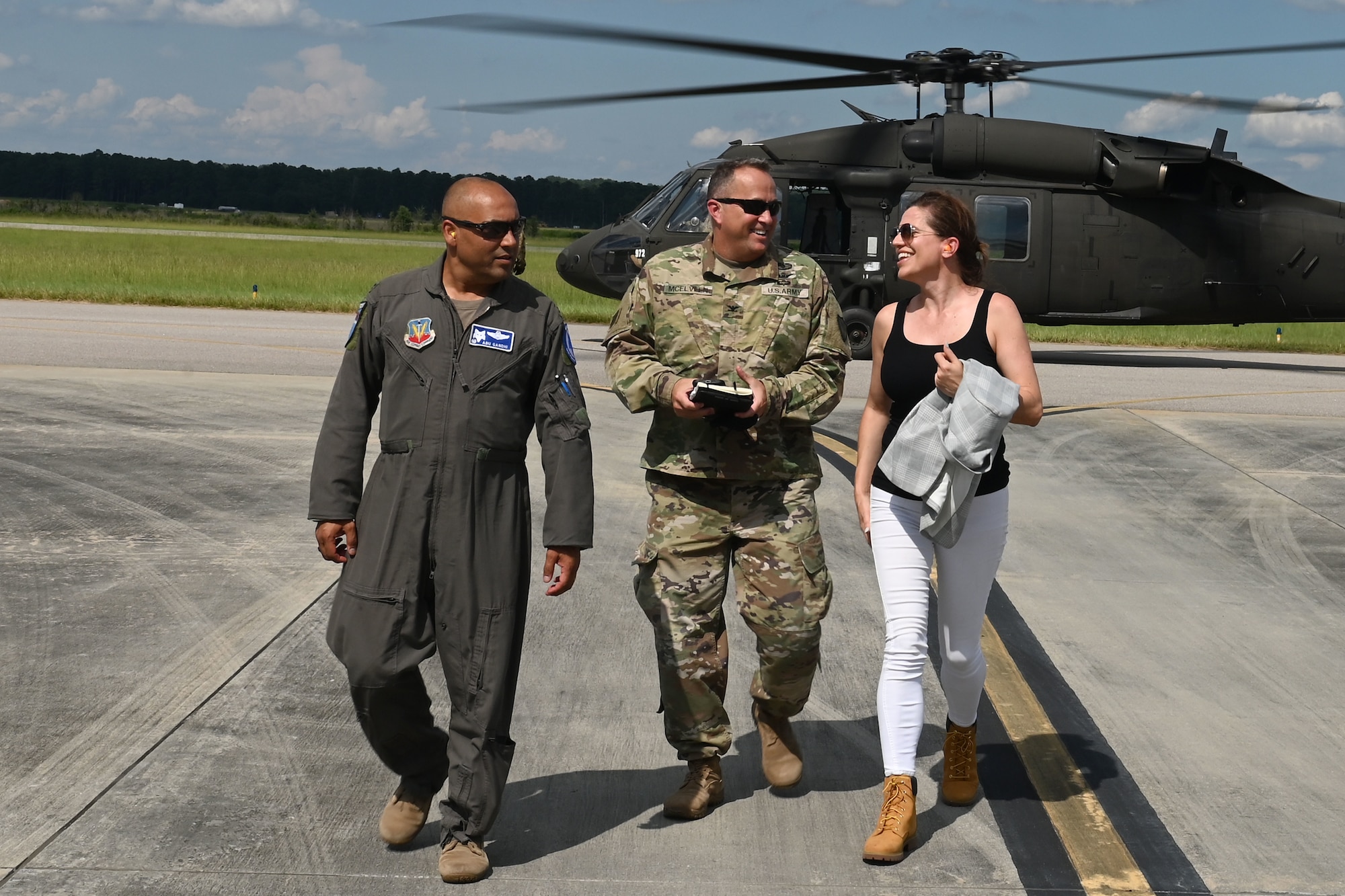 U.S. Rep. Nancy Mace from Charleston, South Carolina exits a UH-60 Black Hawk helicopter with U.S. Army Col. John McElveen, 59th Troop Command commander and U.S. Air Force Col. Akshai Gandhi, 169th Fighter Wing commander, after an aerial tour of McEntire Joint National Guard Base and the McCrady Training Center, South Carolina during her visit Aug. 19, 2021. The purpose of her visit is to meet with South Carolina National Guard leadership to discuss the current state of the South Carolina National Guard and future endeavors for the organization as well as a familiarization of the base and the capabilities of the units housed there. (U.S. Air National Guard photo by Senior Master Sgt. Edward Snyder, 169th Fighter Wing Public Affairs)