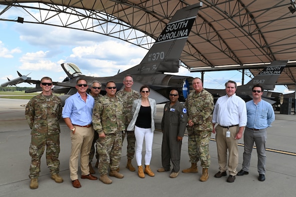 U.S. Rep. Nancy Mace from Charleston, South Carolina and her staff pose for a picture with leaders from the South Carolina National Guard in front of a 169th Fighter Wing F-16 Fighting Falcon jet during her visit to McEntire Joint National Guard Base, South Carolina Aug. 19, 2021. The purpose of her visit is to meet with South Carolina National Guard leadership to discuss the current state of the South Carolina National Guard and future endeavors for the organization as well as a familiarization of the base and the capabilities of the units housed there. (U.S. Air National Guard photo by Senior Master Sgt. Edward Snyder, 169th Fighter Wing Public Affairs)