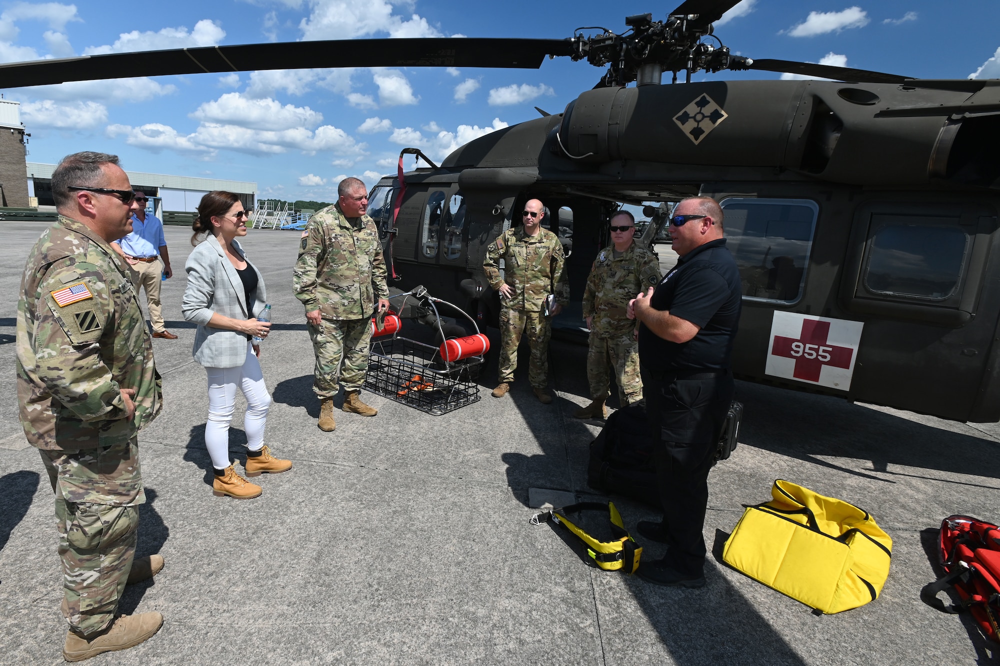 U.S. Rep. Nancy Mace from Charleston, South Carolina receives an operational brief on the capabilities of the South Carolina Helicopter Aquatic Rescue Team (SC-HART) before boarding a UH-60 Black Hawk helicopter for an aerial tour of McEntire Joint National Guard Base and the McCrady Training Center, South Carolina during her visit Aug. 19, 2021. The purpose of her visit is to meet with South Carolina National Guard leadership to discuss the current state of the South Carolina National Guard and future endeavors for the organization as well as a familiarization of the base and the capabilities of the units housed there. (U.S. Air National Guard photo by Senior Master Sgt. Edward Snyder, 169th Fighter Wing Public Affairs)