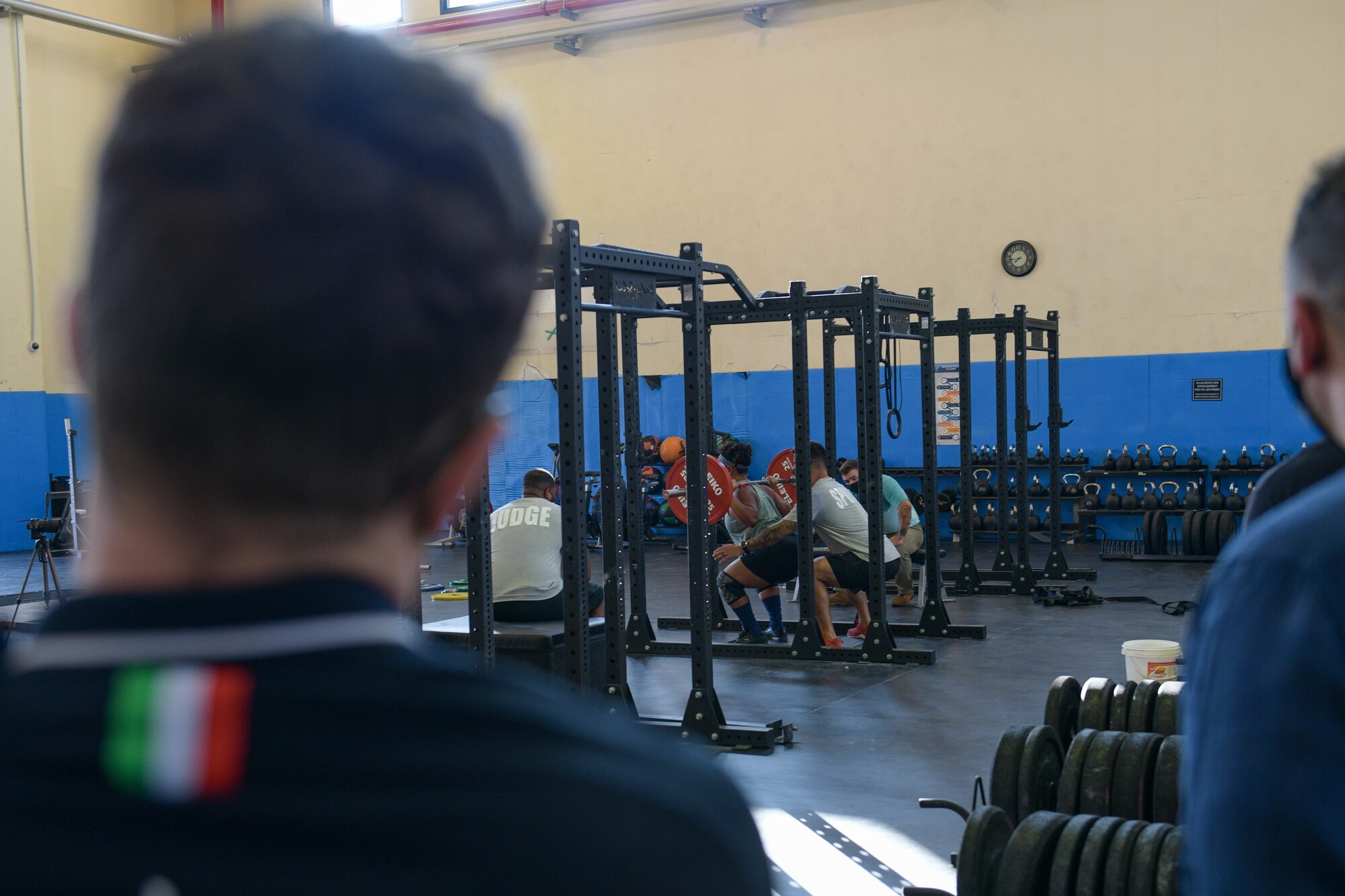 Mirko Zanni, 2020 Summer Olympics weightlifting bronze medalist winner, watches a powerlifting competition at Aviano Air Base, Italy, Aug. 19, 2021. Mirko is an Italian weightlifter who won the bronze medal in the men's 67 kg event at the 2020 Summer Olympics. (U.S. Air Force photo by Senior Airman Brooke Moeder)