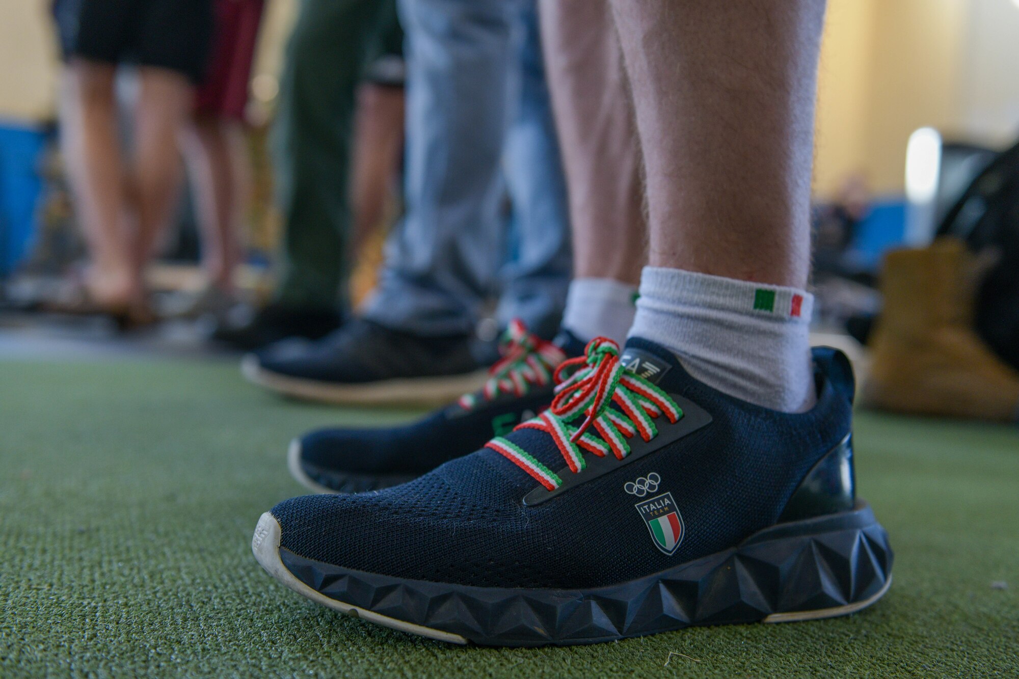 Mirko Zanni, 2020 Summer Olympics weightlifting bronze medalist winner, watches a powerlifting competition at Aviano Air Base, Italy, Aug. 19, 2021. Mirko is an Italian weightlifter who won the bronze medal in the men's 67 kg event at the 2020 Summer Olympics and he toured Aviano with his father. (U.S. Air Force photo by Senior Airman Brooke Moeder)