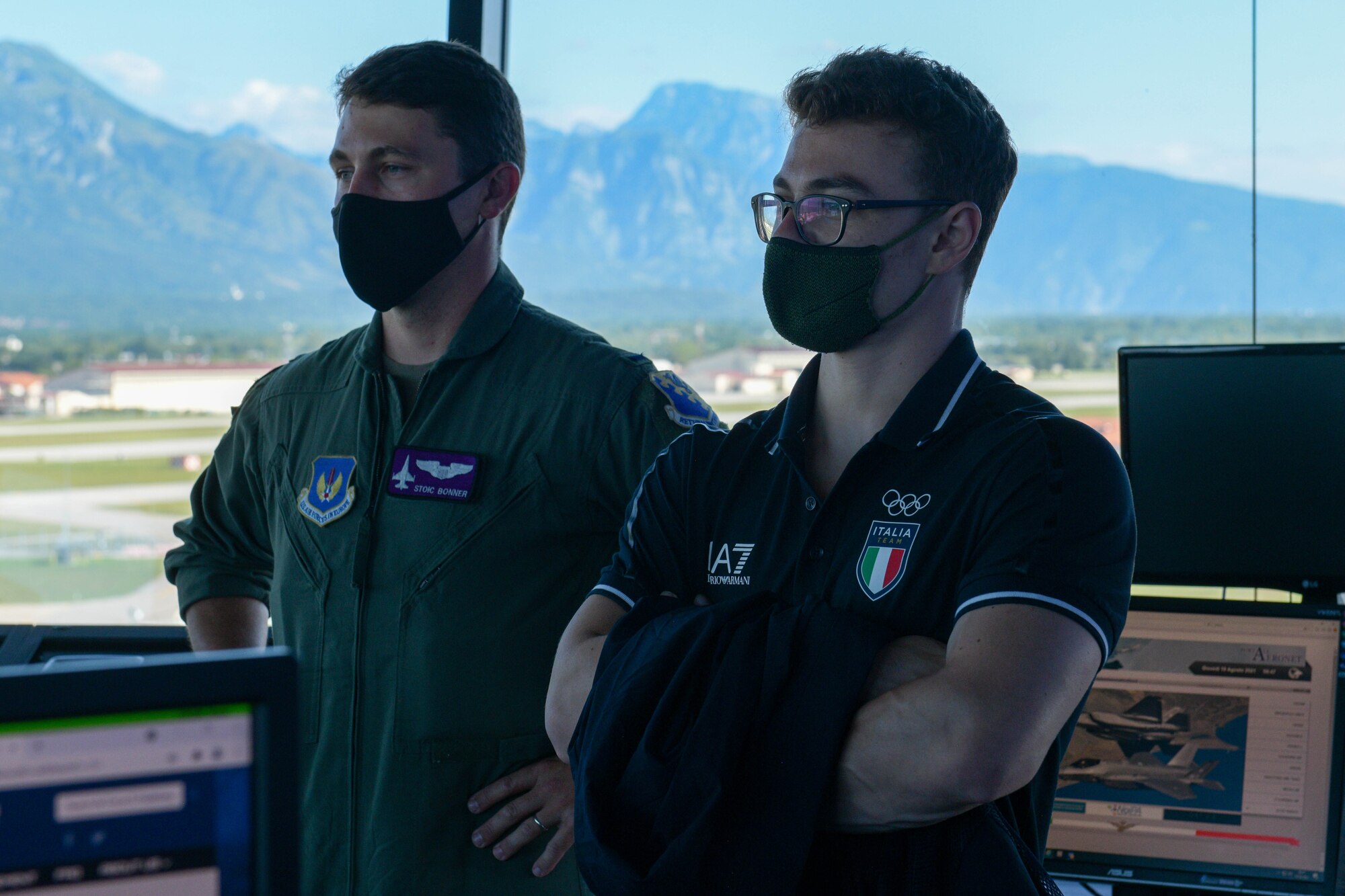 UU.S. Air Force 1st Lt. Ian Bonner, 510th Fighter Squadron F-16 Fighting Falcon pilot, and Mirko Zanni, 2020 Summer Olympics weightlifting bronze medalist winner, stand in the Air Traffic Control tower at Aviano Air Base, Italy, Aug. 19, 2021. Mirko and his father toured Aviano and different facilities including the ATC tower, Radar Approach Control facility and had the opportunity to look at F-16 Fighting Falcon. (U.S. Air Force photo by Senior Airman Brooke Moeder)