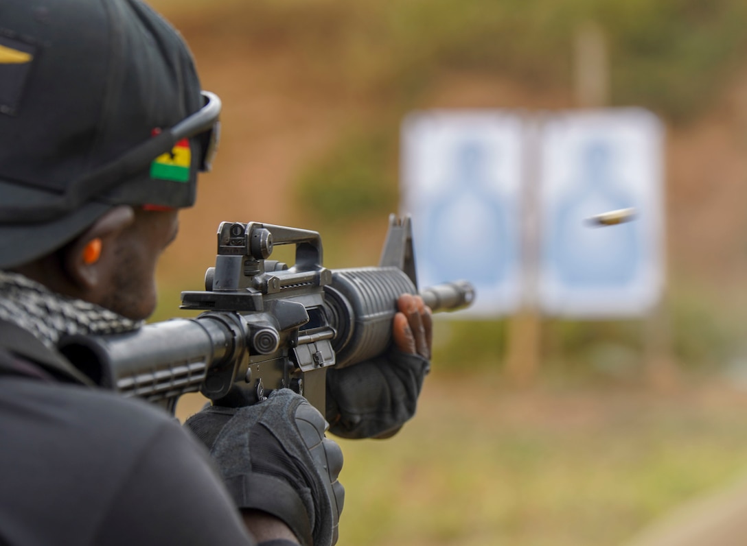 A member of the Ghanaian Special Boat Squadron conducts a live-fire drill at the Naval Training Command in Nutekpor-Sogakope, Ghana, Aug. 12, 2021. Combined Task Force-68, deployed aboard the USS Hershel “Woody” Williams, conducted Theatre Security Cooperation training with the SBS at NAVTRAC to enhance operational capabilities and readiness throughout Western Africa.