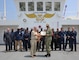 Capt. Janice G. Smith, Commodore, Military Sealift Command Atlantic, presents the Armed Forces Civilian Service Medal to Capt. Andrew Lindey, master of USNS Comfort.