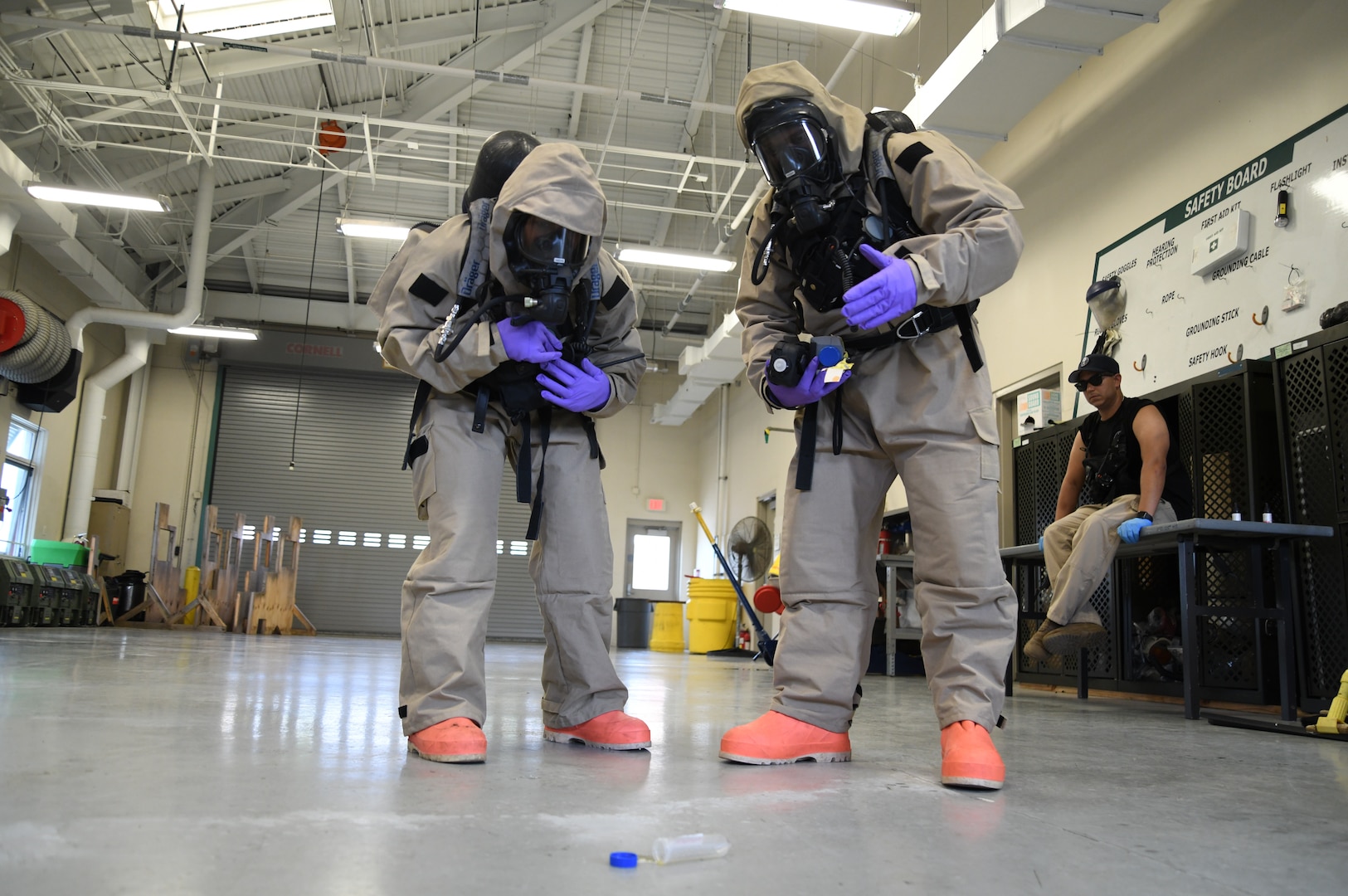 Weapons of Mass Destruction Civil Support Team members in protective equipment respond to a potential chemical, biological, or radiological threat while participating in a training event at Ft. Buchanan, Puerto Rico, Aug. 17, 2021. The training scenarios include response, evaluation, testing, and securing the area of contamination. The members are made up of soldiers and airmen from the 33rd WMD-CST, District of Columbia National Guard, along with other CST's from Texas, North Carolina, West Virginia, Puerto Rico and the District of Columbia Fire and Emergency Management Service.