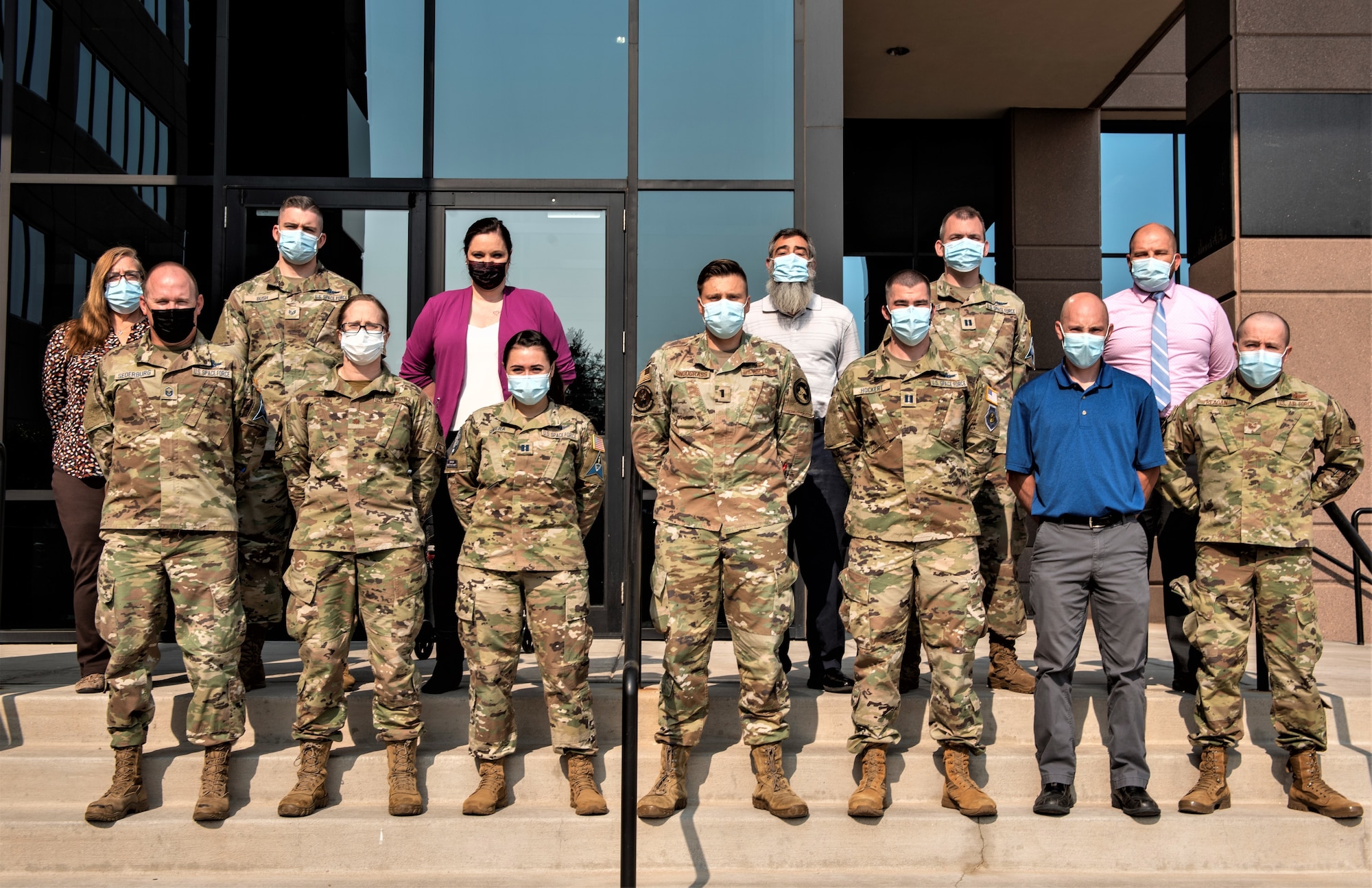 Space Flag 21-3 participants pose for a group photo in Colorado Springs, Colorado, Aug. 11, 2021. Space Flag is a training exercise focused on protecting and defending the United States’ access to freedom to maneuver in a contested space warfighting domain. (U.S. Space Force photo by Airman 1st Class Kaitlin Castillo)