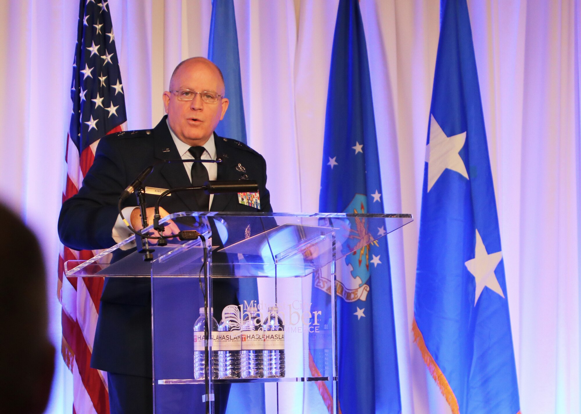 Man speaking at podium
