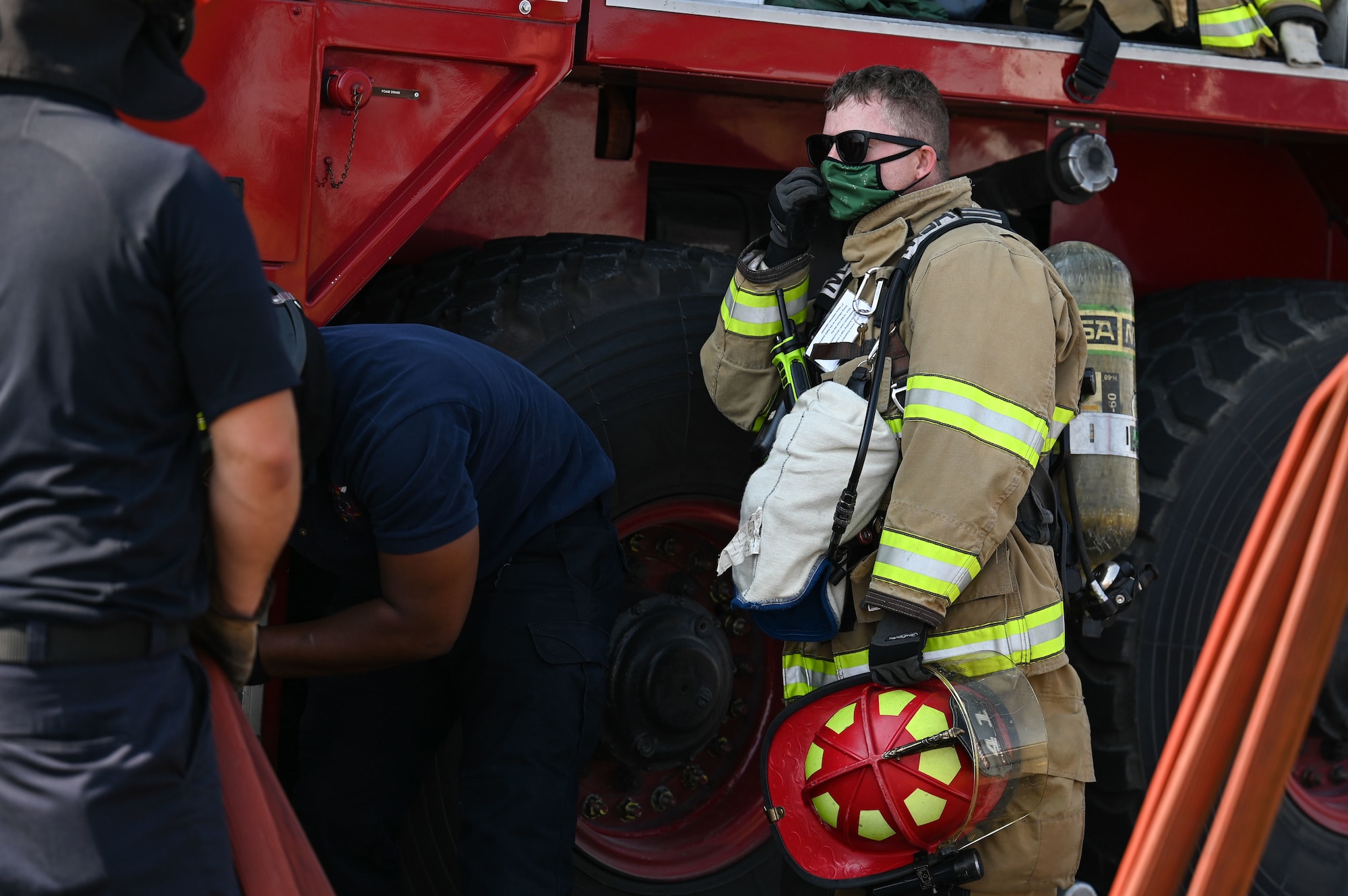 Firefighters participate in an exercise.