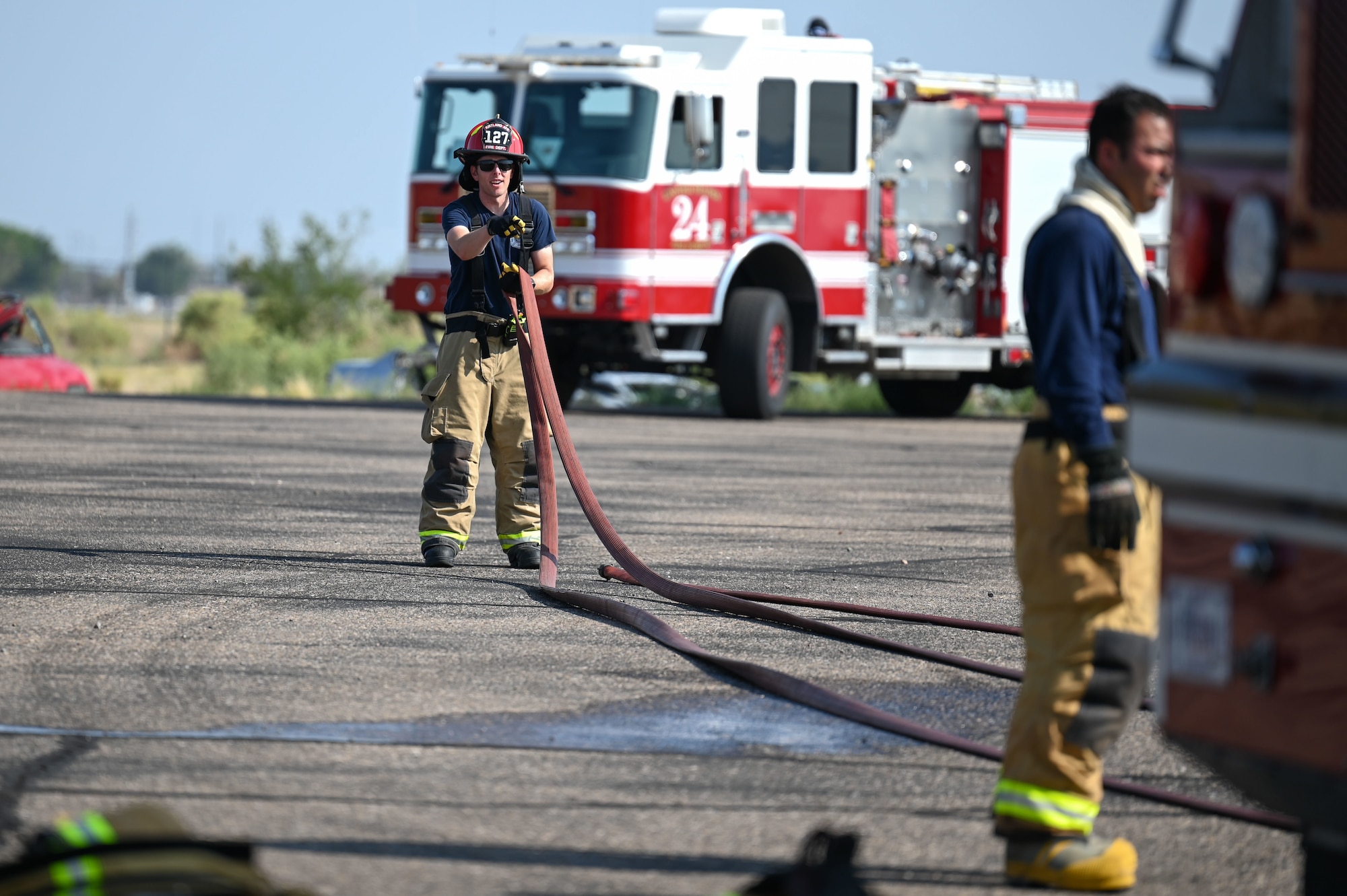 Firefighters participate in an exercise.