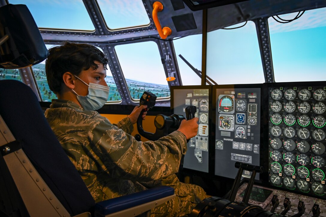 Civil Air Patrol cadets fly the 103rd Airlift Wing’s C-130H Hercules Multi-Mission Crew Trainer during a visit to Bradley Air National Guard Base in East Granby, Connecticut, Aug. 13, 2021. Cadets from the Connecticut Wing’s Danielson and Plainville squadrons got an up-close look at C-130H aircraft, the engines that power them, and learned about the 103rd Airlift Wing’s mission. (U.S. Air National Guard photo by Tech. Sgt. Steven Tucker)