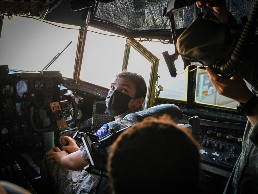 A Civil Air Patrol cadet looks around the cockpit of a 103rd Airlift Wing C-130H Hercules aircraft during a tour of Bradley Air National Guard Base in East Granby, Connecticut, Aug. 13, 2021. Cadets from the Connecticut Wing’s Danielson and Plainville squadrons got an up-close look at C-130H aircraft, the engines that power them, and learned about the 103rd Airlift Wing’s mission. (U.S. Air National Guard photo by Tech. Sgt. Steven Tucker)