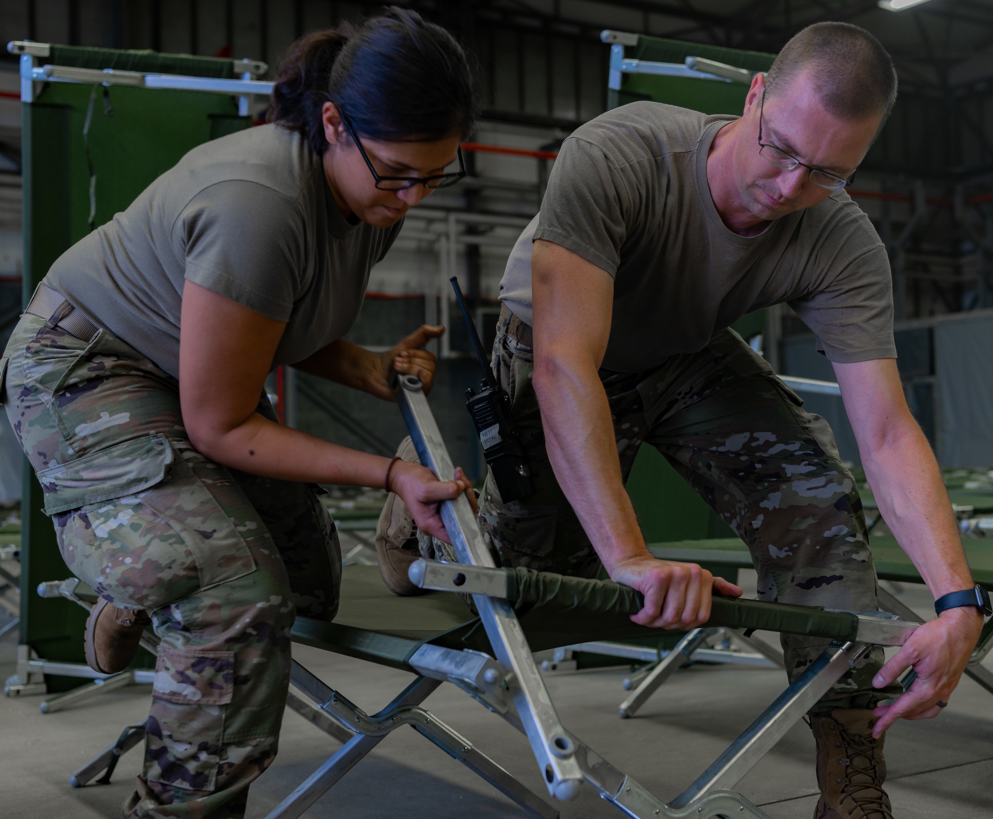 Airmen prepare cots